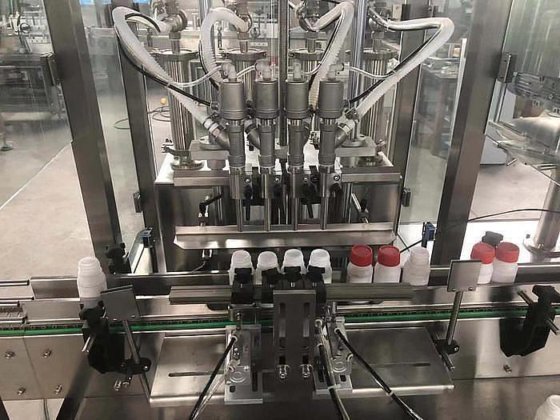 描述中国高品质肥皂盒瓶灌装机液体灌装机带传送带供应商