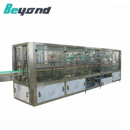 用于食用油灌装机的高品质旋转式辣椒油瓶灌装旋盖贴标机