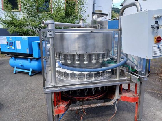 ガラス瓶真空充填機