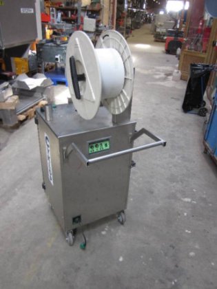 Cyclops strapping machine