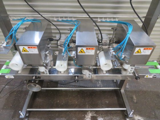 2011 レオン自動機 株式会社 UC213