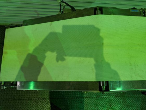 (株)テムス　傾斜L型コンベヤ