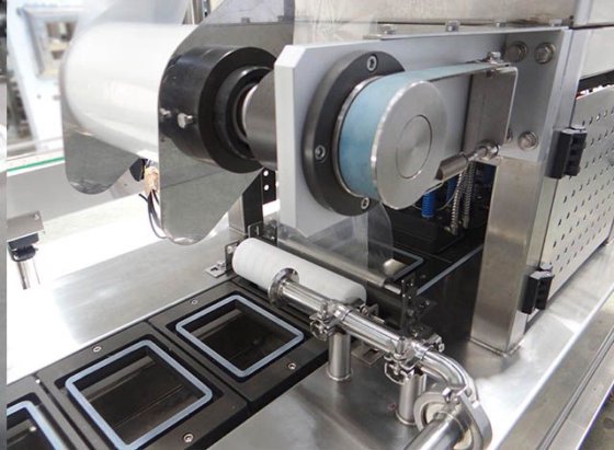 間歇式ボックス包装豆腐封口機