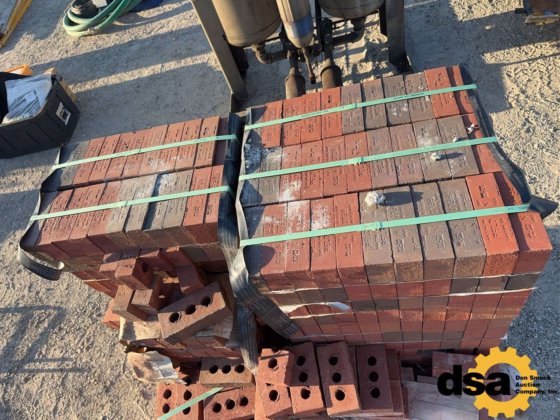 Pallet of Unused Red Bricks