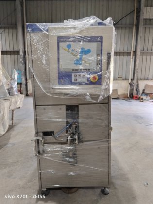 2004 利乐45贴盖机