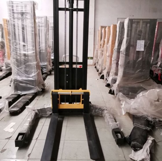 セミストラドル電動油圧パレットフォークリフトリフティングスタッカー