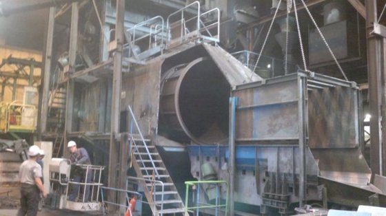 1999 Continuous tumble belt shotblast