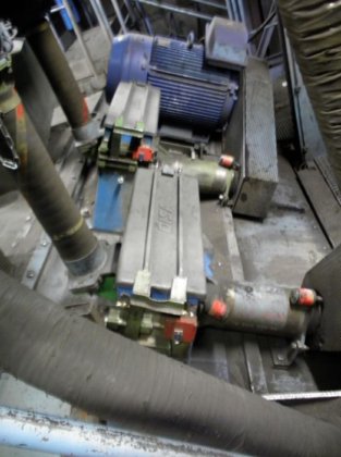 1999 Continuous tumble belt shotblast