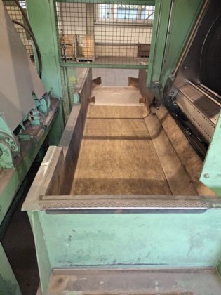 Tumble belt shot blast machine