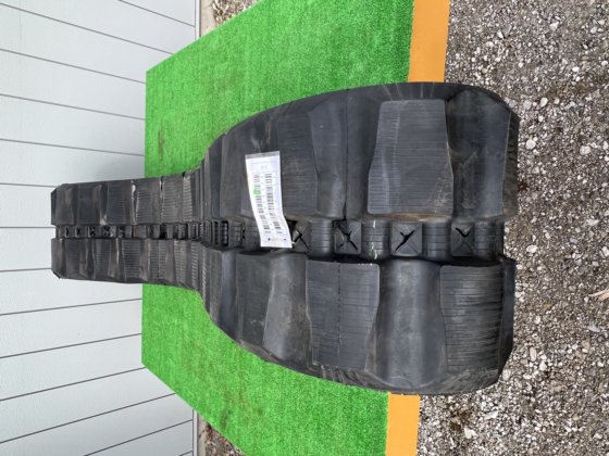 CAT 289D. Rubber track line