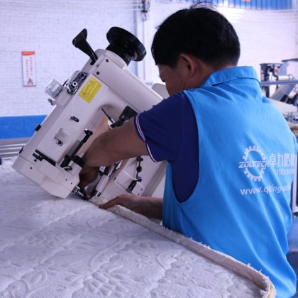 Zolytechマニュアルマットレステープエッジ縫製機 - 24時間オンラインサポート