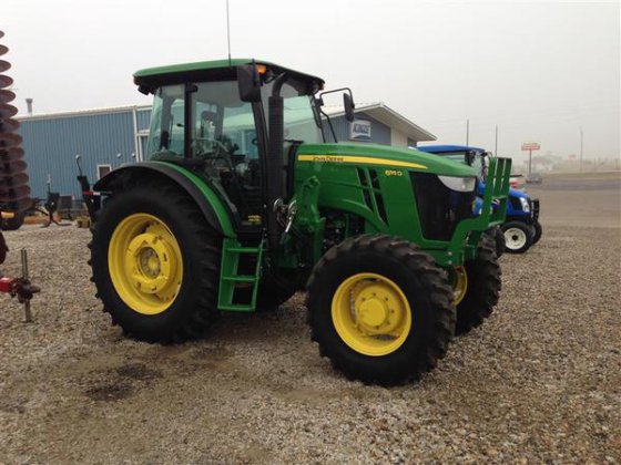 John Deere 6115D in Harlan,