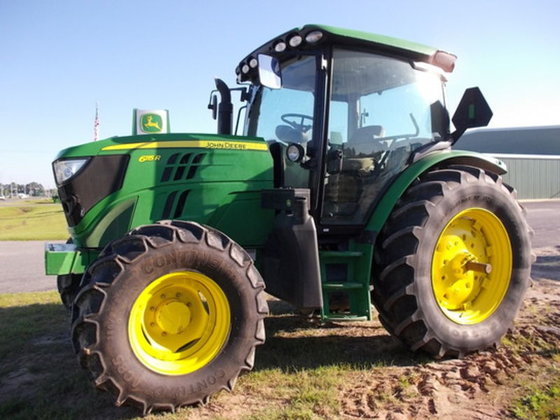 John Deere 6115R in Ocilla,