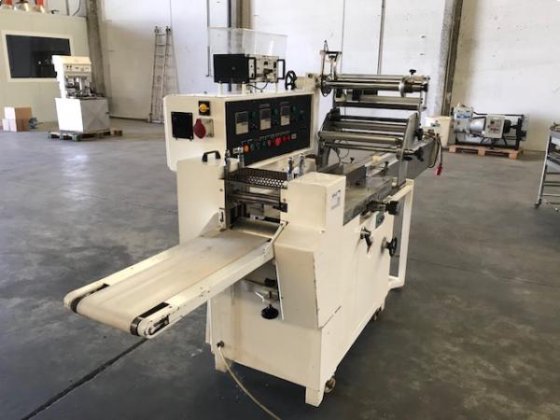 Pallet flow-pack machine