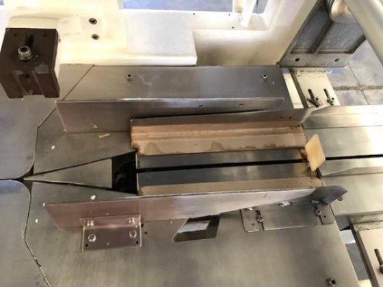 Pallet flow-pack machine