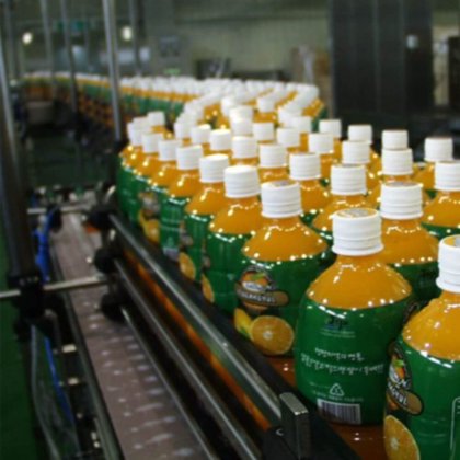 PET 瓶用三合一果汁自动灌装机