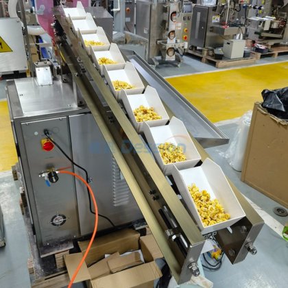 半自動小袋顆粒包装機は、ポップコーン、ドライフルーツ、膨化シリアル、ゴマ袋包装に適しています
