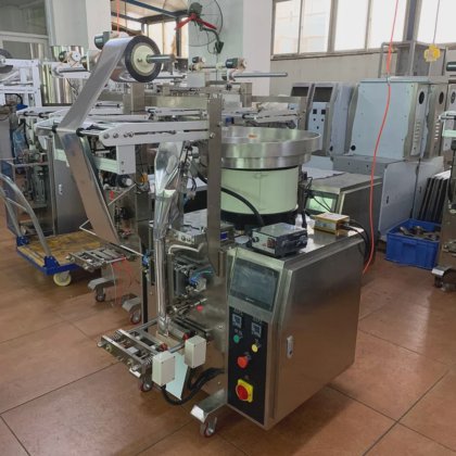 垂直型小型自動計数スクリュー充填包装機