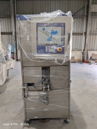 2004 利乐45贴盖机