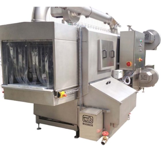 箱やパレットを洗浄するためのトンネル