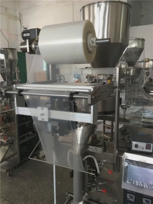 Dession 米および他の中国の自動微粒のコップの充填機