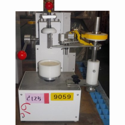 【蓋のテープ止め機】