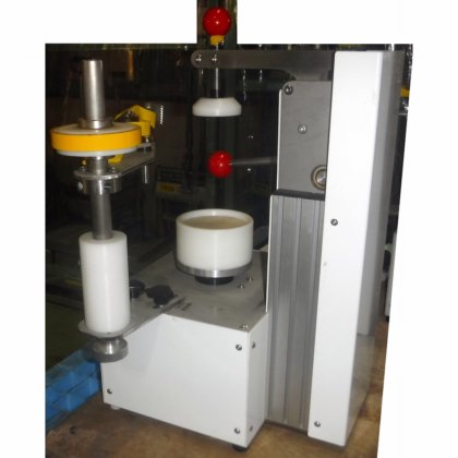 【蓋のテープ止め機】