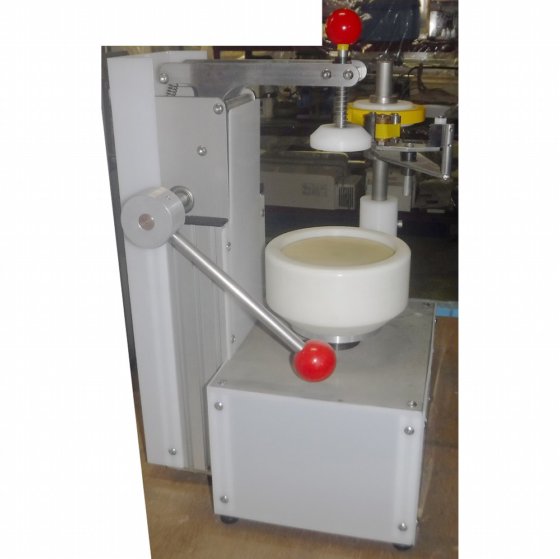 【蓋のテープ止め機】