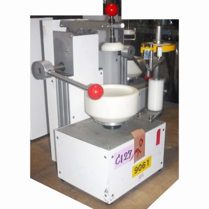 【蓋のテープ止め機】