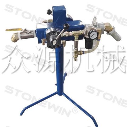 ROCK DRILLING MACHINE