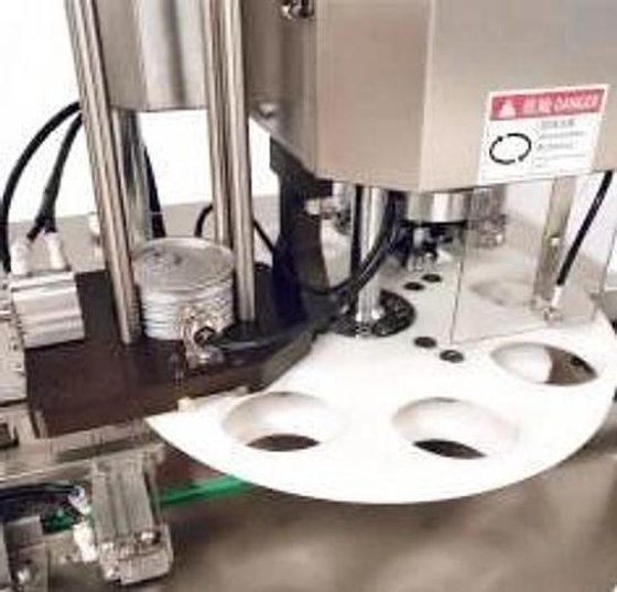 真空充氮罐装奶粉封口机