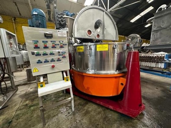 Centrifuga de cestos com descarga