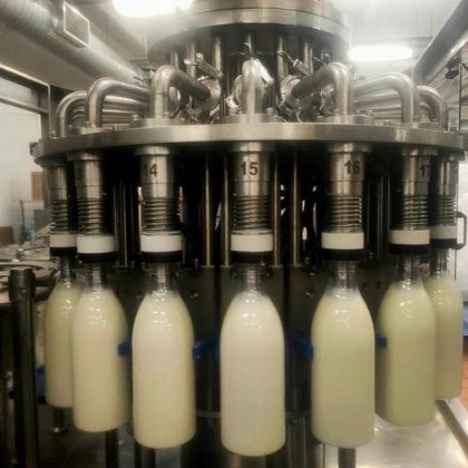 高速全自动果汁牛奶液体瓶清洗灌装旋盖包装机