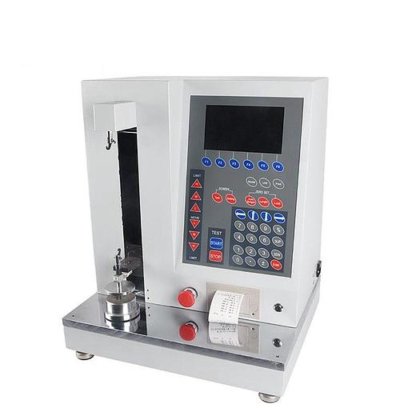 Automatic spring testing machine