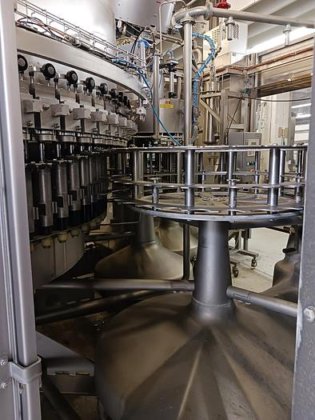 洗浄・充填・封止機