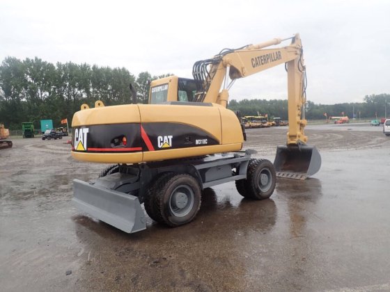 Caterpillar M318C Excavator picture