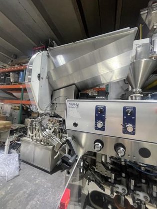 AUTOMATIC INLINE BOTTLE CAPPING MACHINE WITH VERTICAL WHEEL CAP SORTER ...