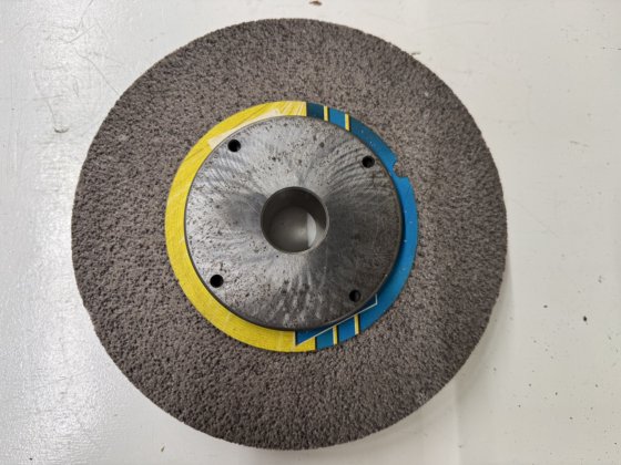 SCHLEIFSCHEIBENFLANSCH TRIPET