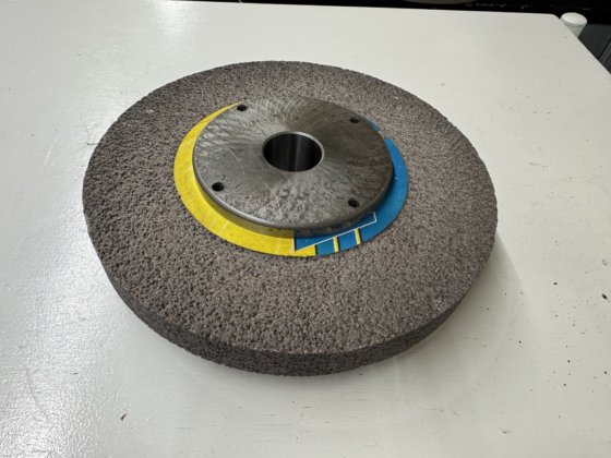 SCHLEIFSCHEIBENFLANSCH TRIPET