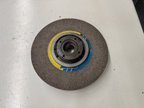 SCHLEIFSCHEIBENFLANSCH TRIPET