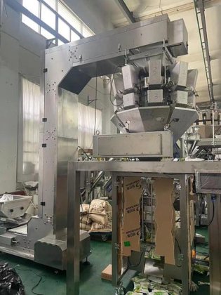 多機能の自動縦の袋のパッキング機械 fo ピーナツ米のナットの微粒の包装機械