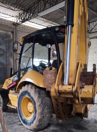 Retroescavadeira Cat 416E