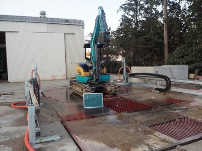 剛洗 建機洗浄ロボ. 次世代自動建機洗浄システム