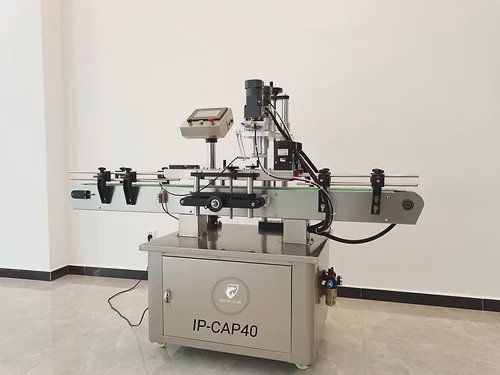 Automatic inline capping machine