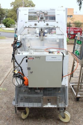 カートン折り機