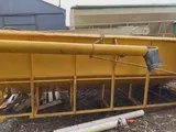 GROUPER WITH UNLOADING AUGER