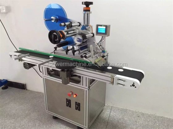 用于扁瓶或方瓶、肥皂的自动容器顶部不干胶贴标机