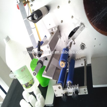 SL130 半自动圆瓶双面贴标机,适用于酒瓶、塑料瓶、坛子、食品罐