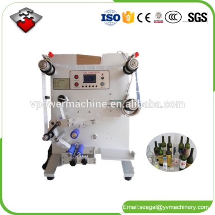 SL130 半自动圆瓶双面贴标机,适用于酒瓶、塑料瓶、坛子、食品罐