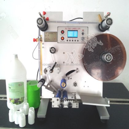 广州工厂 SL130 半自动圆瓶双面贴标机，用于酒瓶、塑料瓶、坛子、食品罐